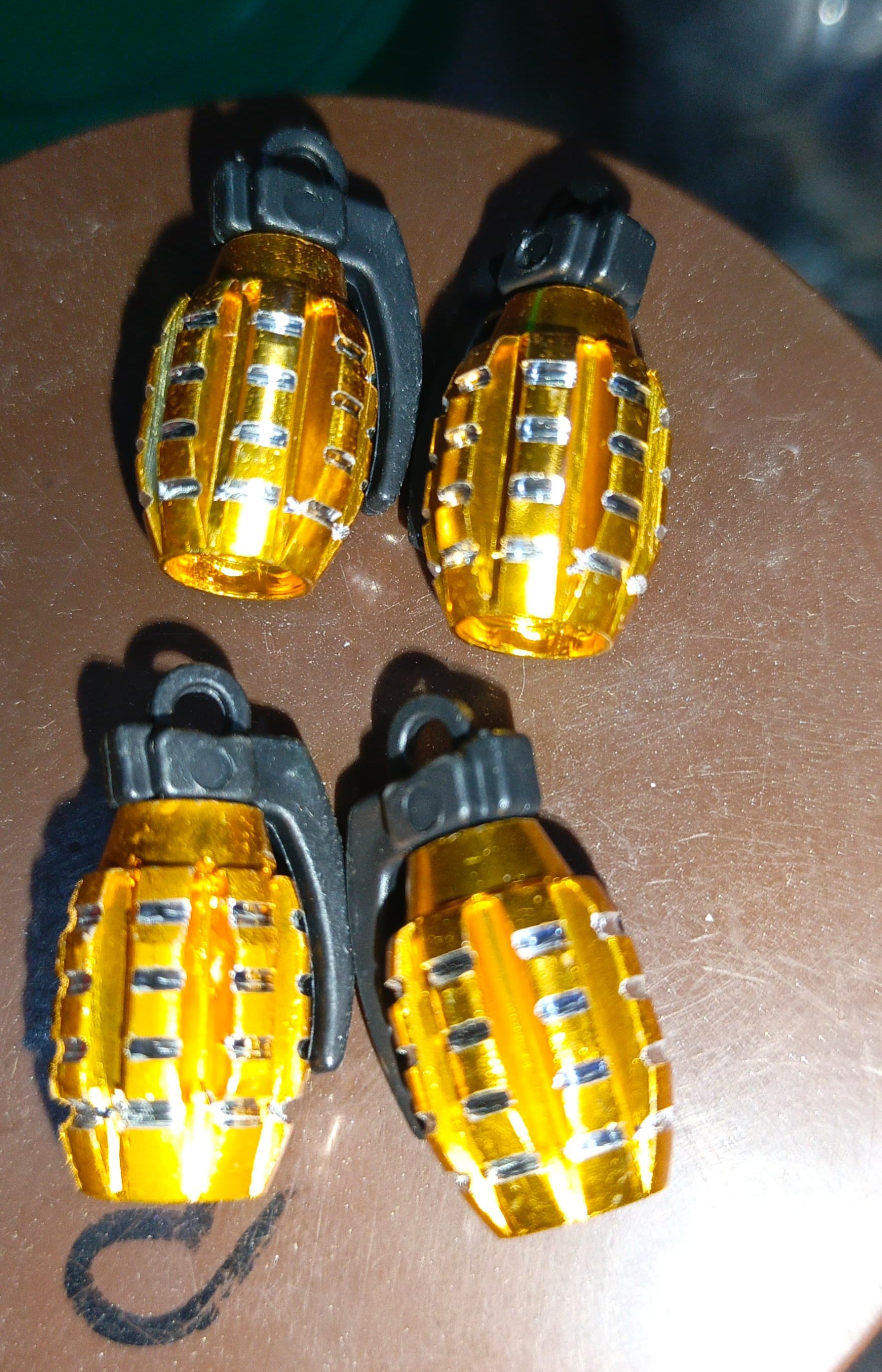 Pack of 2 - Grenade Tyre Air Valve Nozzle Caps for Car and Bikes (Golden)